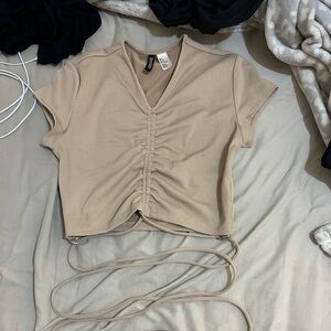Tan crop top with wrap around tie
